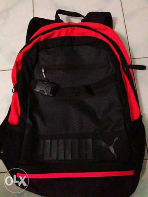 Black And Orange Puma Backpack