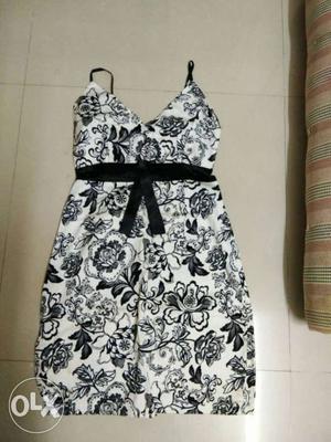 Black and white mini one piece.. size small..