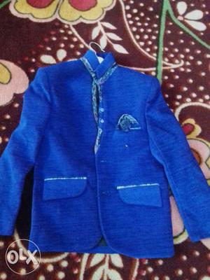 Brand new coat for age 4 to 7. Royal blue colour.