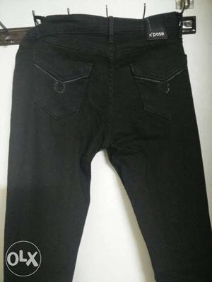 Branded blue and black ladies jeans of size 30 in