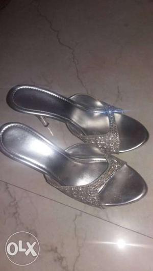 Branded silver high heels(4") in good condition