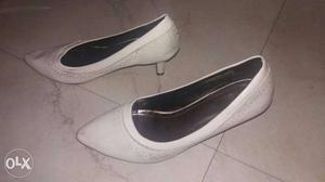 Branded white heels(3") in good condition