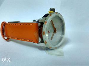 Fastrack women's watch. Never used.orange leather