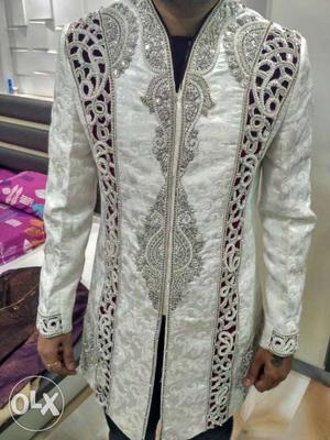 Groom wedding outfit royal whiteand maroon work