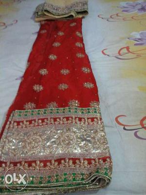 Red And Gold Floral Textile