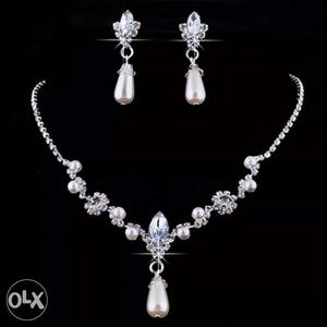 White Pearl Pendant Necklace And Earrings