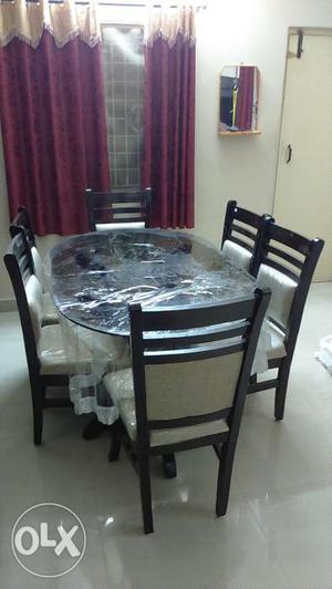 6 seat dining table is available