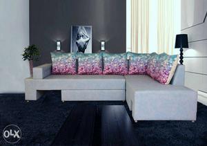 Blue Fabric Sectional Couch And Throw Pillows