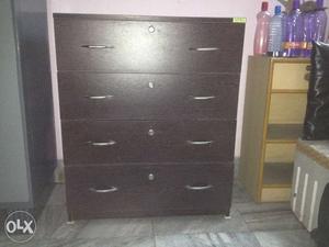 Branded American walnut chest with four