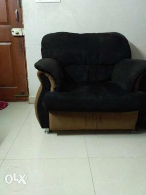 Brown And Black Fabric Sofa Chair in very good condition