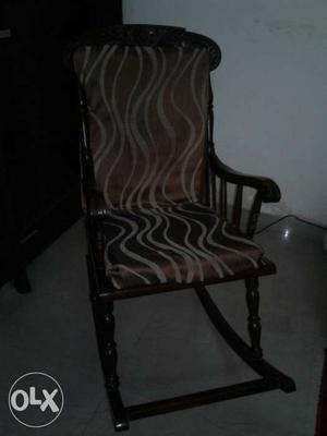 Brown Wooden Frame Padded Rocking Chair