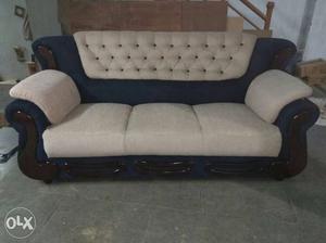 Brown Wooden Framed White 3 Seat Sofa