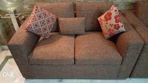 Gray Loveseat With Throw Pillows