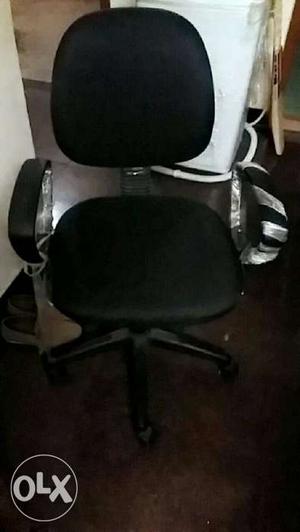 Office Chair. black chair with wheels and