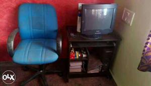 Office Rolling Armchair And Crt Tv