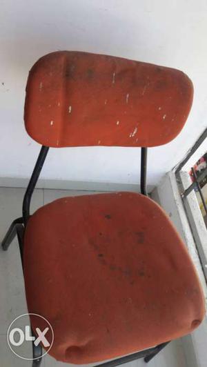 Red padded Metal chair