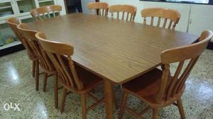 Teak dining table set.with 8 Rub wood chairs