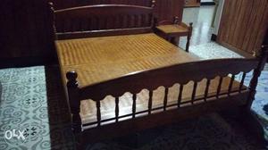 Teak wooden cot with side table.