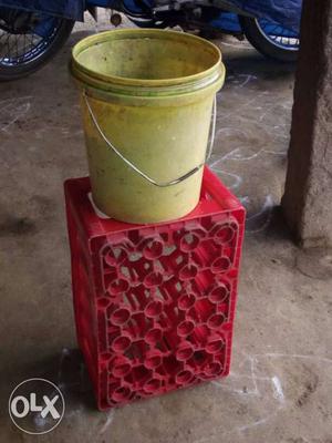 Yellow Plastic Bucket And Red Plastic Crate
