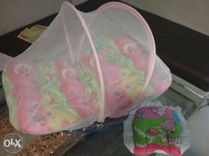 Baby bed with net and pillow. brand new