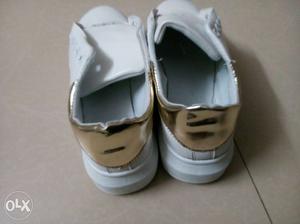 Brand new Pair Of White And Gold casual shoes