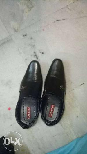 Pair Of Black Leather Choice Dress Shoes
