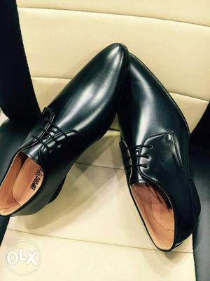 Pair Of Black Leather Low Top Shoes. Brand new Emporio