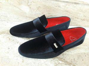 Pair Of Black Suede Flats