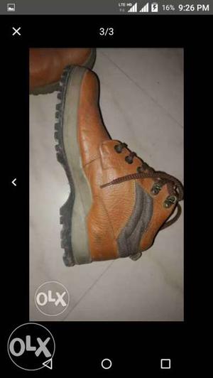 Pair Of Orange And Grey Boots