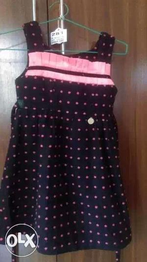 Pink And Black Floral tunic dress for girl age 4-5 yrs.