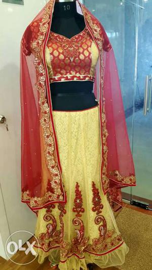 Red golden lahenga for sale in good condition