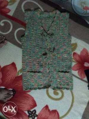 Toddler's Green And Pink Crochet Vest