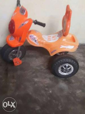 Toddler's Orange Plastic Tricycle