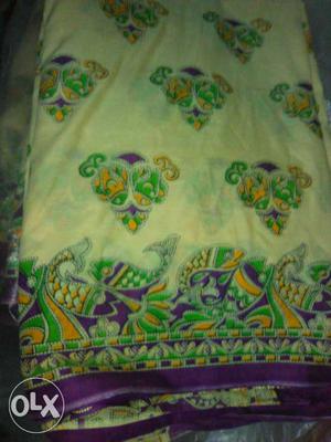 White Green Yellow And Purple Floral Textile