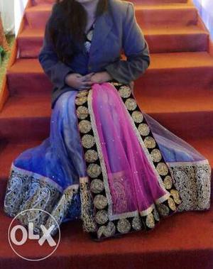 Woman's Purple Pink And Black Sari Outfit