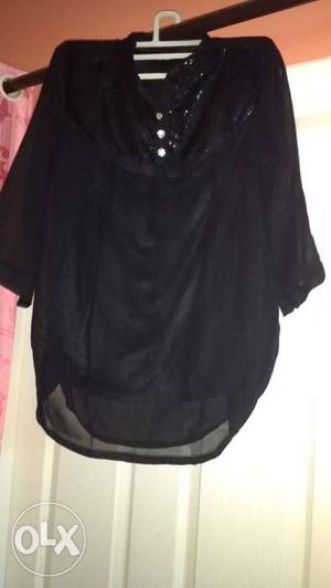 Xl top with sleeves,new one not used
