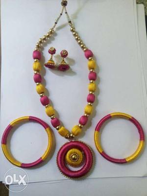 Yellow And Pink Necklace And Bracelets