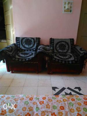 2 Black And Gray Padded Armchairs
