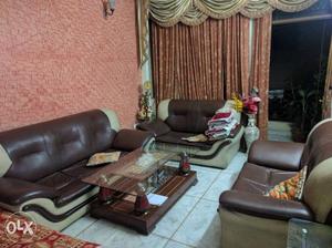 7 seater sofa set(leather) + Center table price