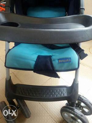 Baby's Blue And Black Stroller