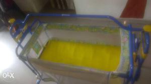 Baby's Blue And Yellow Cradle