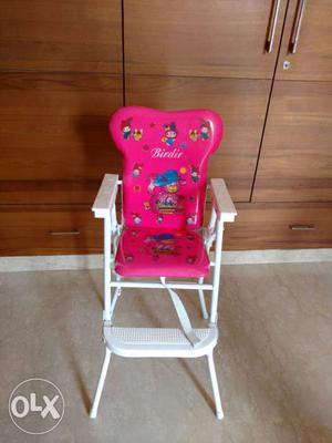 Baby's Pink And White Highchair