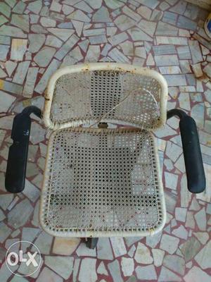 Beige And Black Wicker And Steel Armchair