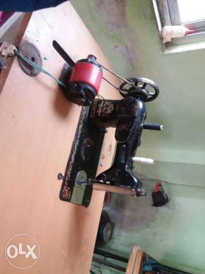 Black Sewing Machine And Table