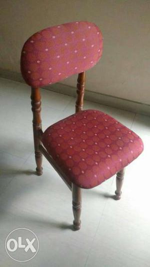 Brown And Red Padded Chair teak wood frames.