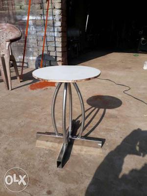 Gray And White Metal Frame Round Table