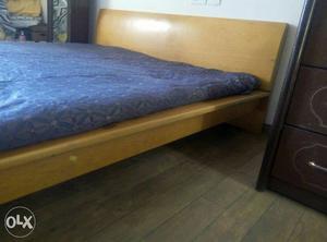 Queen size double bed without box made of ply.