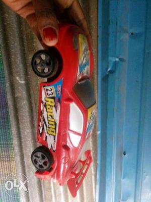 Red And Yellow Sports Coupe Plastic Toy