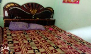 Red Gold And Black Bed Sheet With Pillows