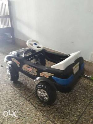 Toddler's Black And Blue Plastic Ride On Toy Car